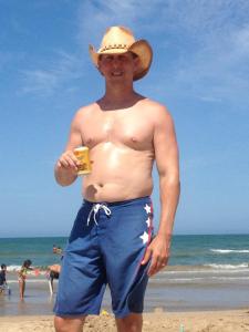 Notice how tiny the Shiner Bock can is compared with the belly backdrop. Yeesh.